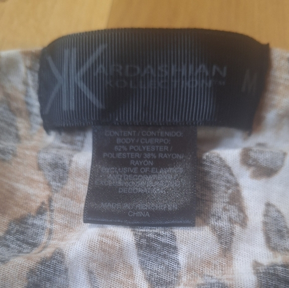Kardashian Kollection - Cheetah Print Blouse with Buckles on the shoulders. - Picture 2 of 2